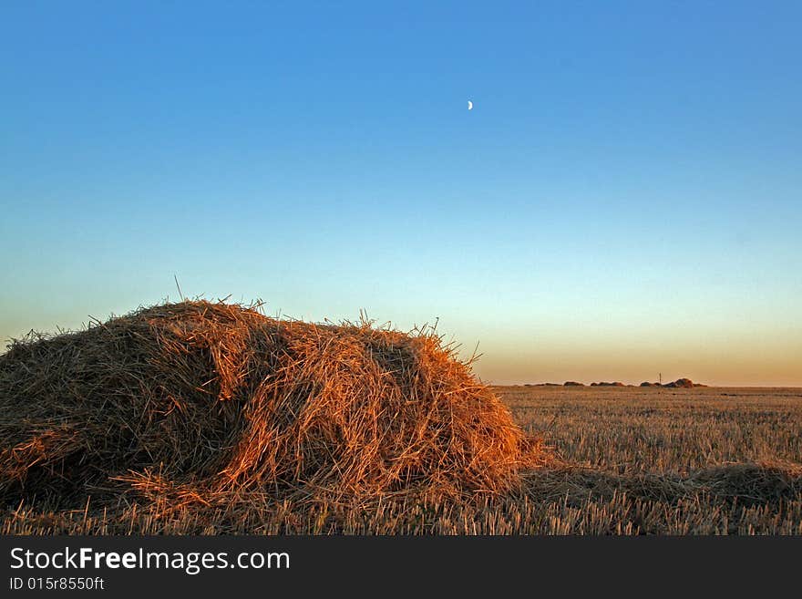 Haystack against the evening sky