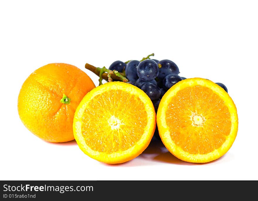 Oranges and grapes isolated on a white background,fruits