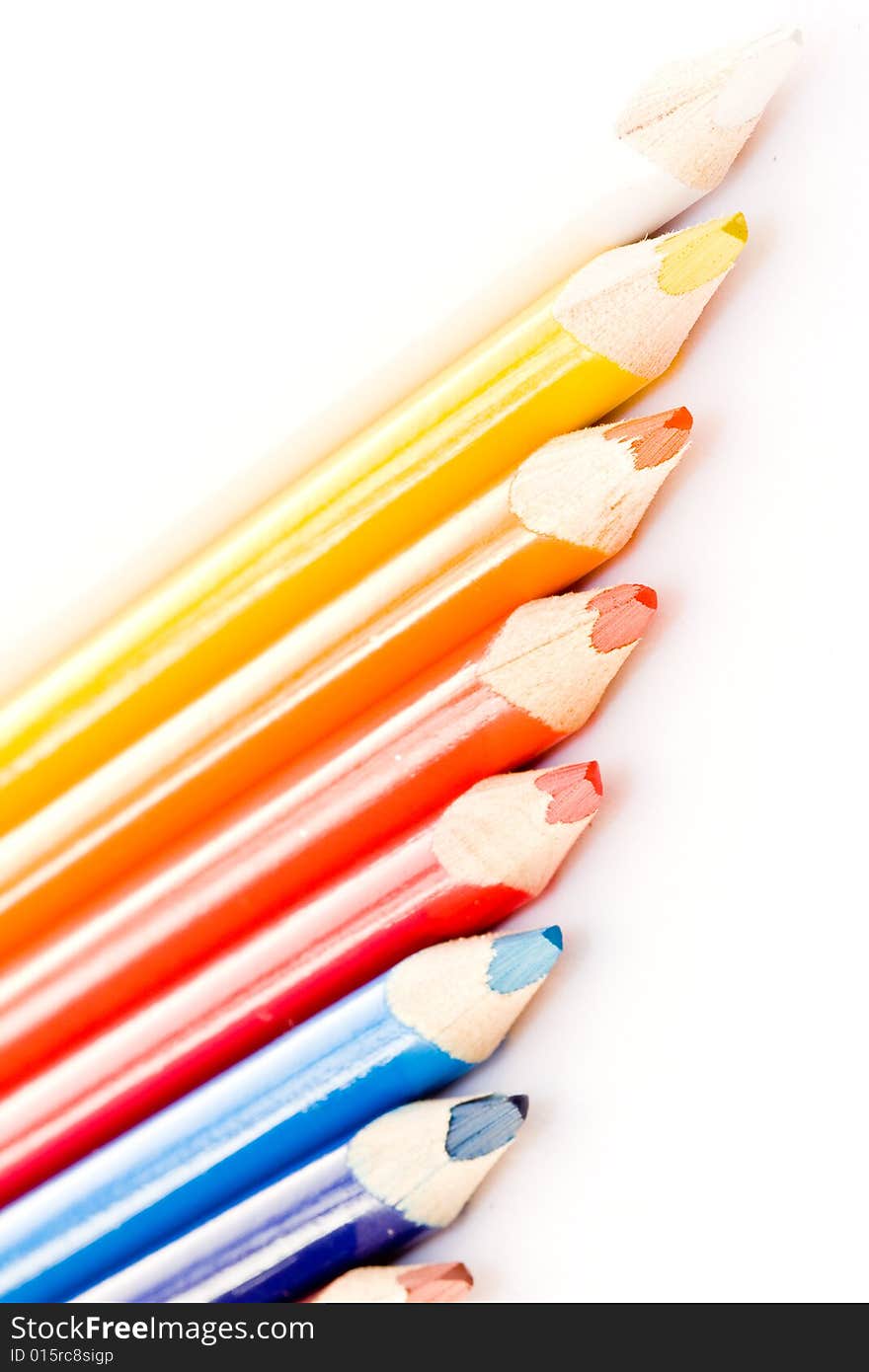 Colour crayons on white background