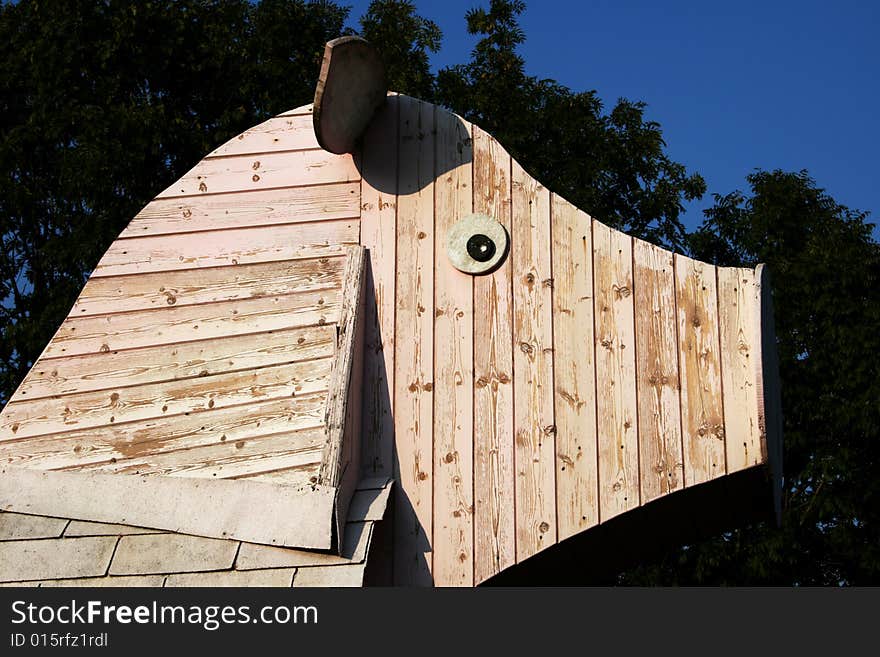 A big wooden pig builded in a farmhouse