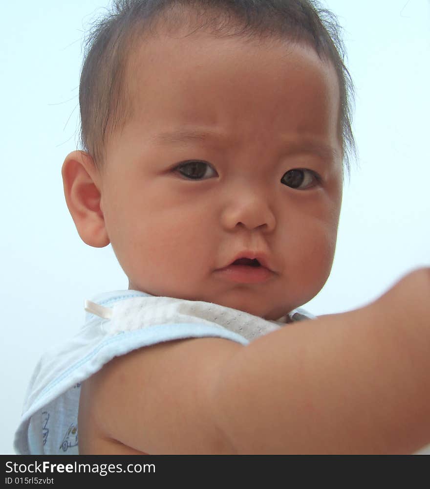 Lovely baby and blue sky on the roof. Lovely baby and blue sky on the roof