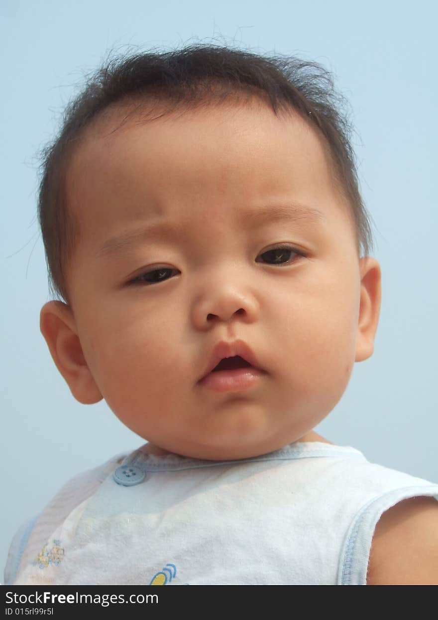 Lovely baby and blue sky on the roof. Lovely baby and blue sky on the roof