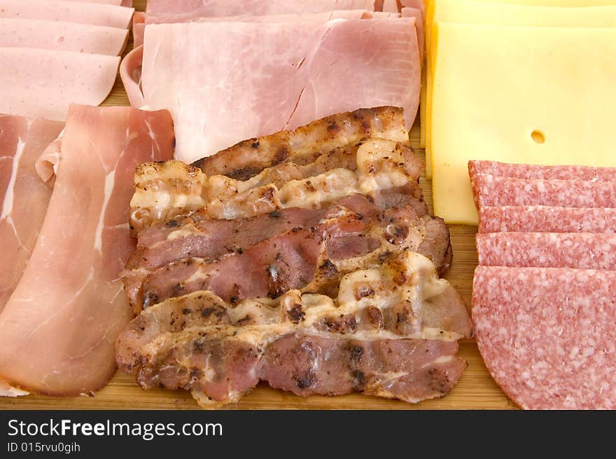 Variety of bread and sandwich spread on cuttingboard