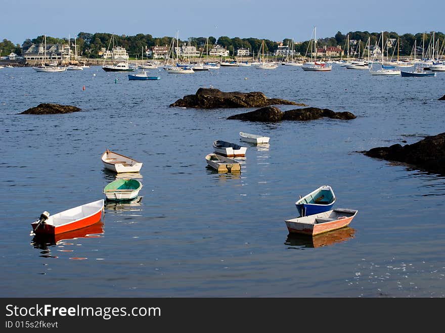 Scenic View of sailboats and dinghies in  Marblehead Neck Harbor. View from Fort Sewall cove at Marblehead Massachusetts. Scenic View of sailboats and dinghies in  Marblehead Neck Harbor. View from Fort Sewall cove at Marblehead Massachusetts