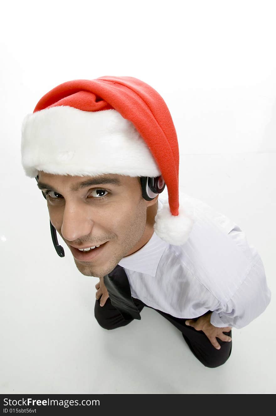 Businessman with headphone and santa cap with white background