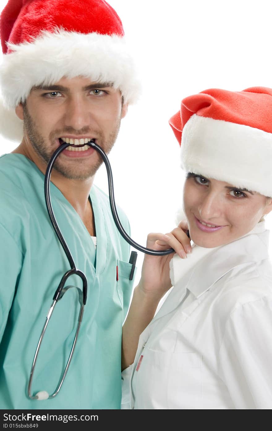 Posing medicals professional with stethoscope on an isolated background. Posing medicals professional with stethoscope on an isolated background