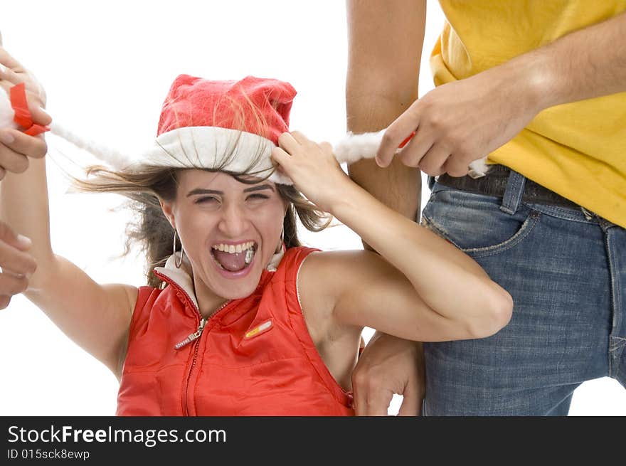 Man pulling cap of woman with white background