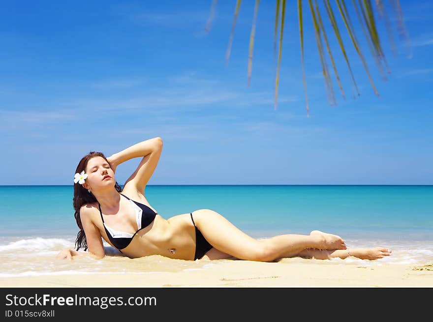 View of a nice  young female in tropical environment. View of a nice  young female in tropical environment