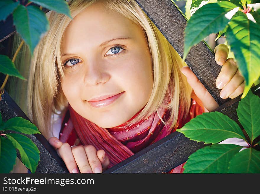 Beautiful girl with fair hair is smiling. Beautiful girl with fair hair is smiling