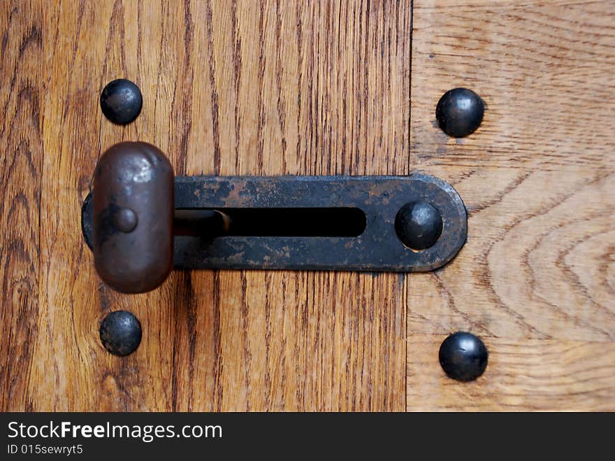 Old latch on a museum door