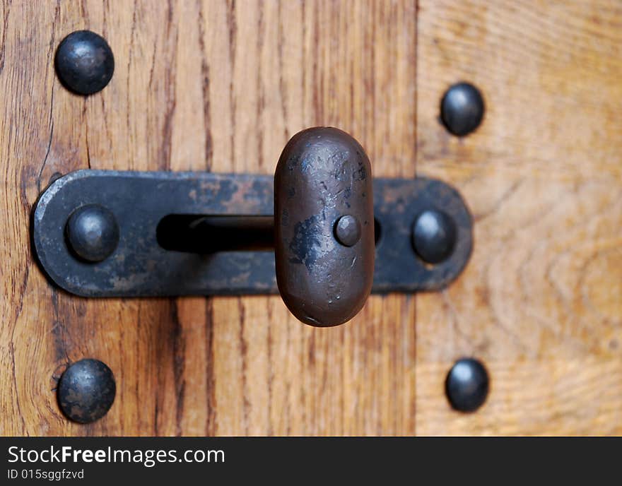 Old latch on a museum door