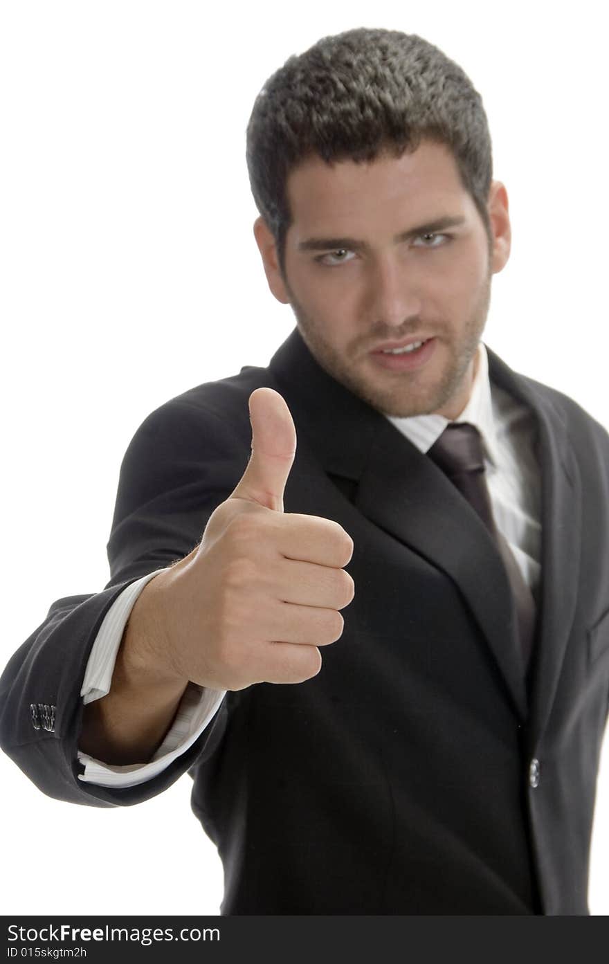 Businessman showing thumb on an isolated background