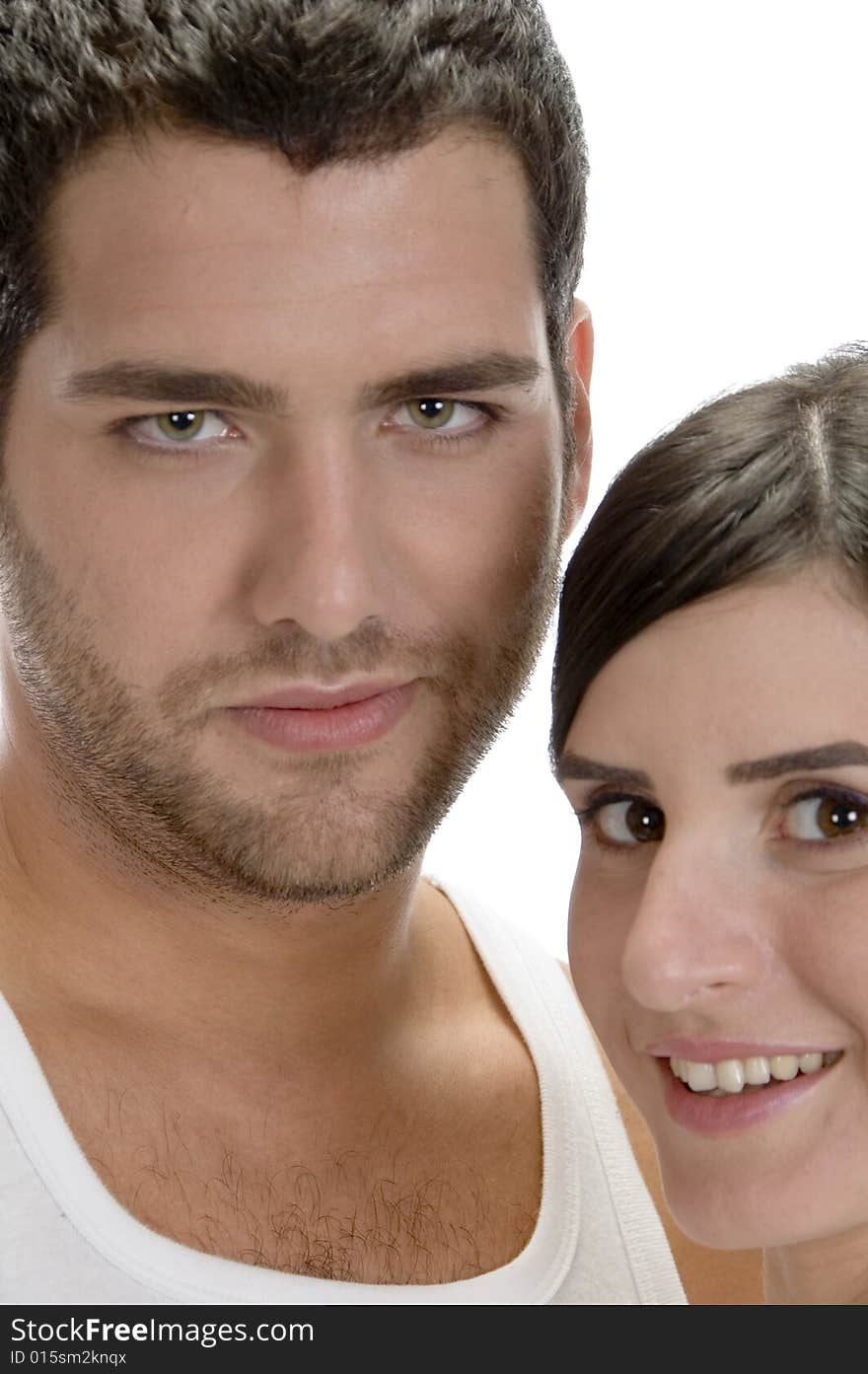 Beautiful young couple on an isolated white background