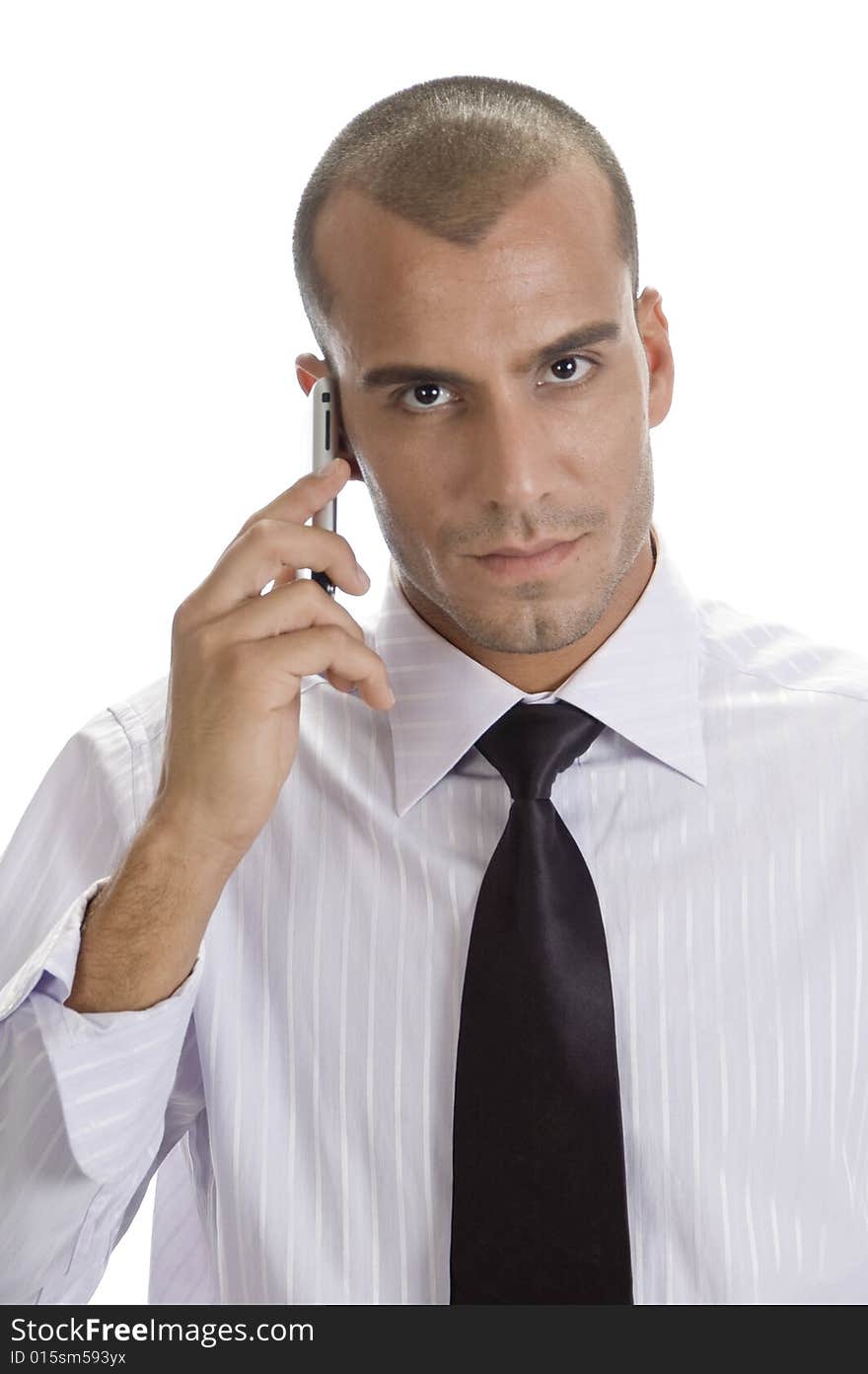 Man with mobile looking to camera on an isolated white background