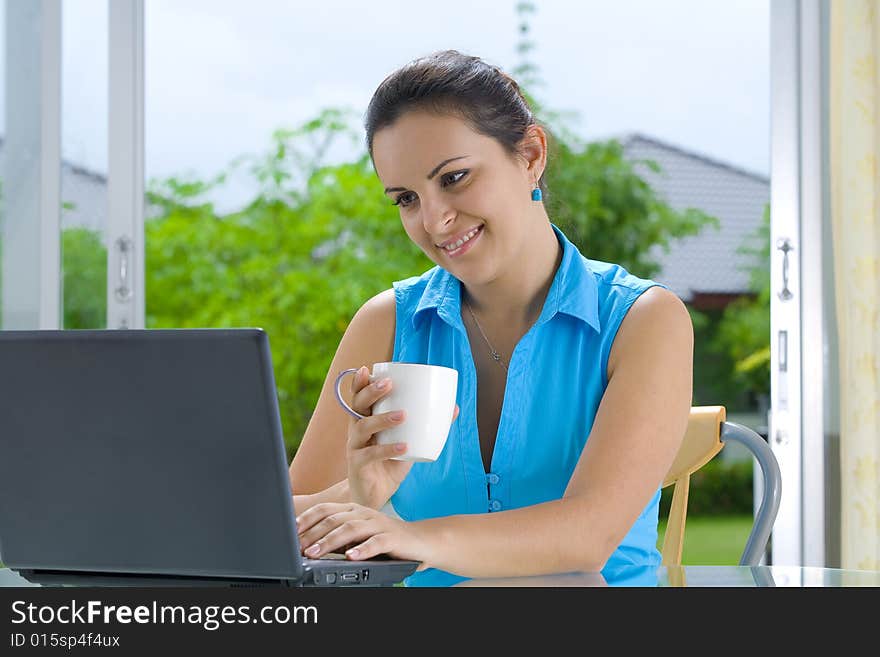 Portrait of young beautiful woman with her laptop. Portrait of young beautiful woman with her laptop