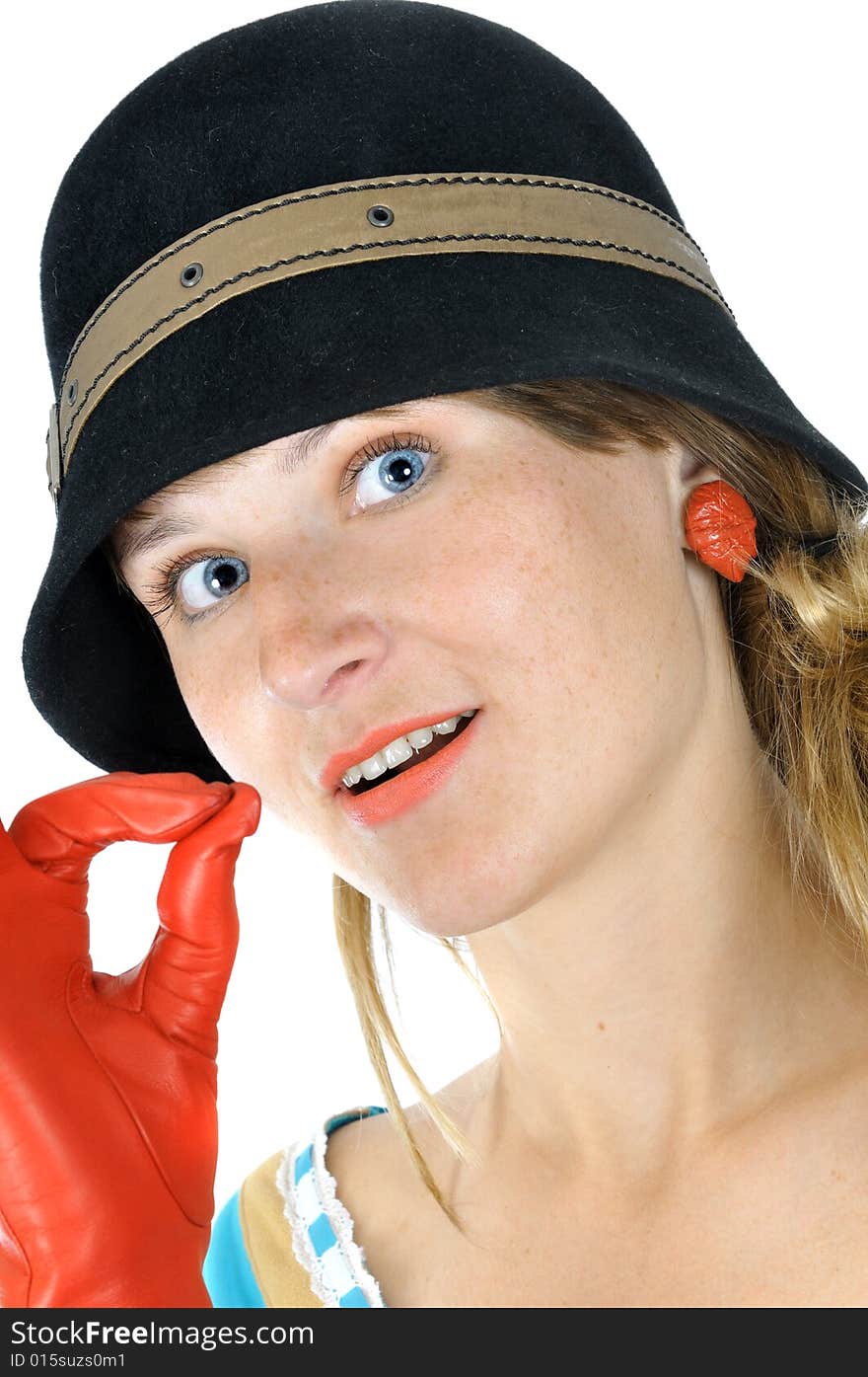 Beautiful girl in hat shows OK, isolated on white