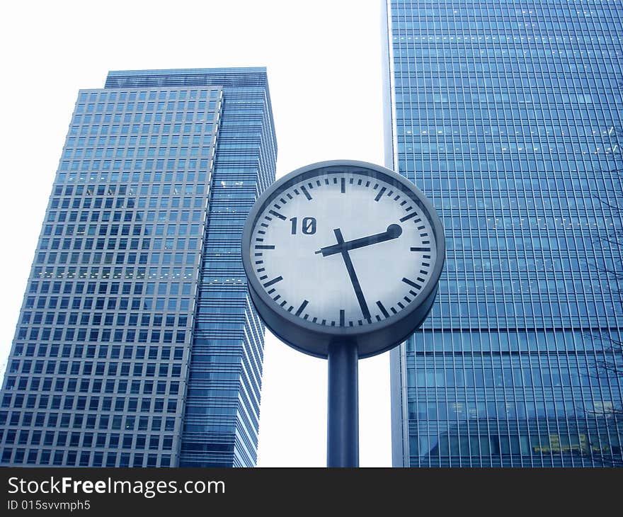 Skyscraper and Clock near Stock Exchange area