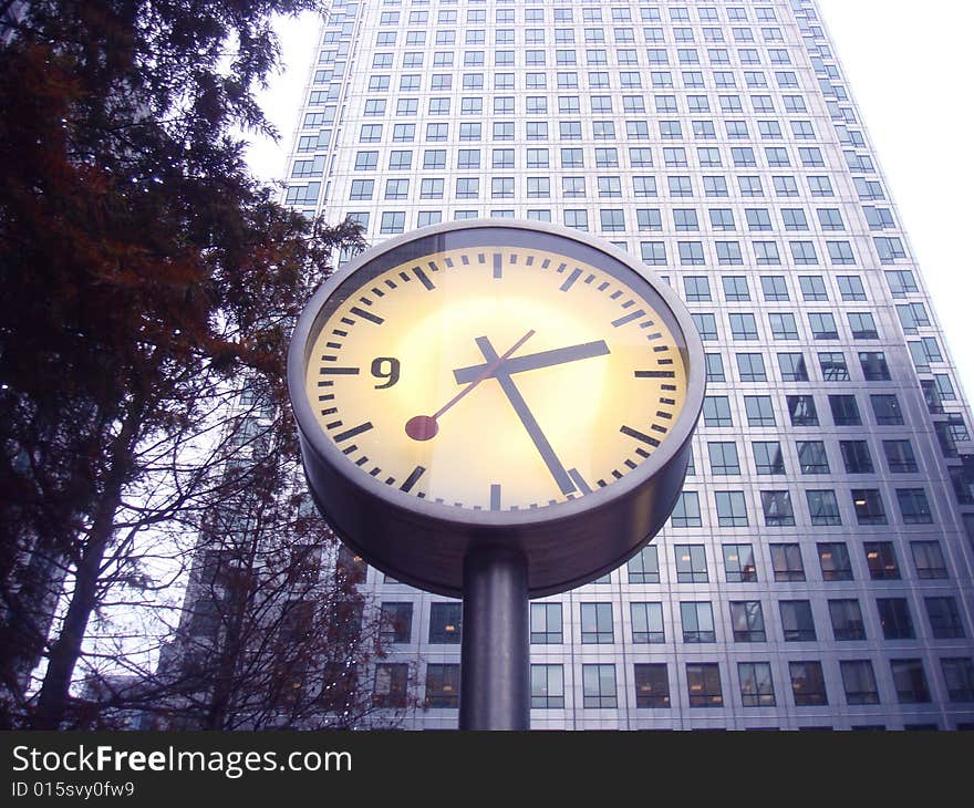 Skyscraper and Clock near Stock Exchange area