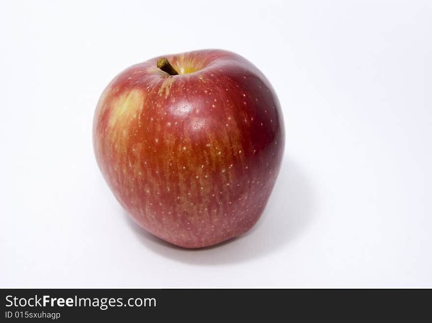 Red fresh apple isolated on white. Red fresh apple isolated on white