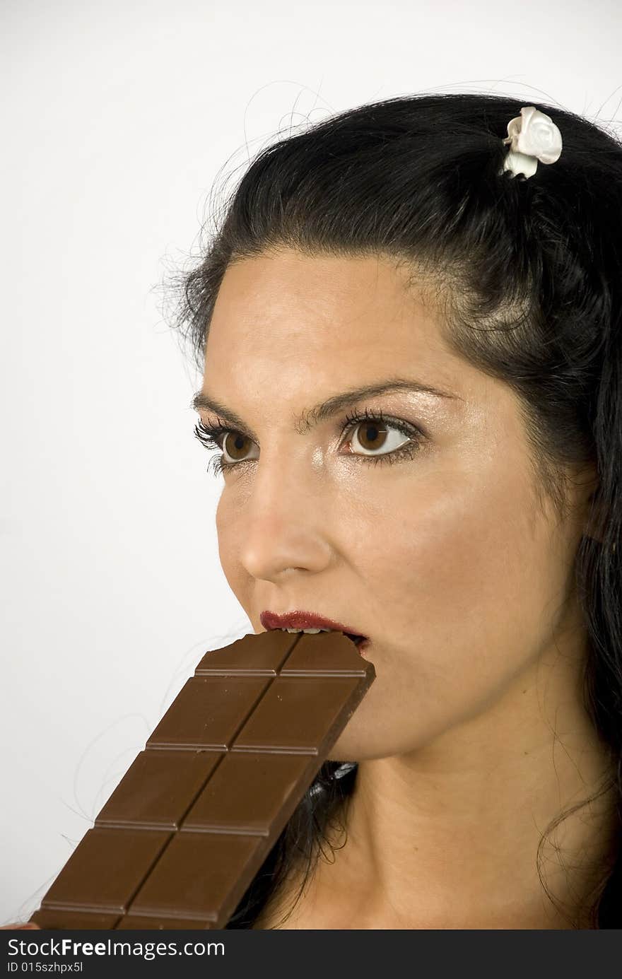 Woman biting chocolate