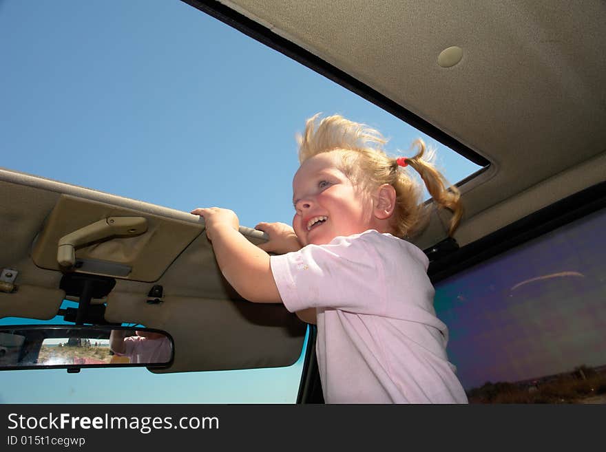 Girl on a background of the car