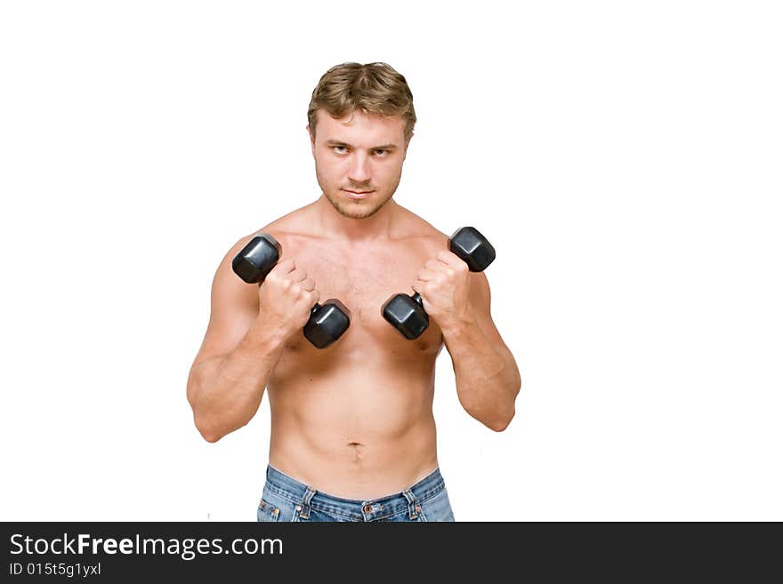 Young man with black dumbbells. Young man with black dumbbells