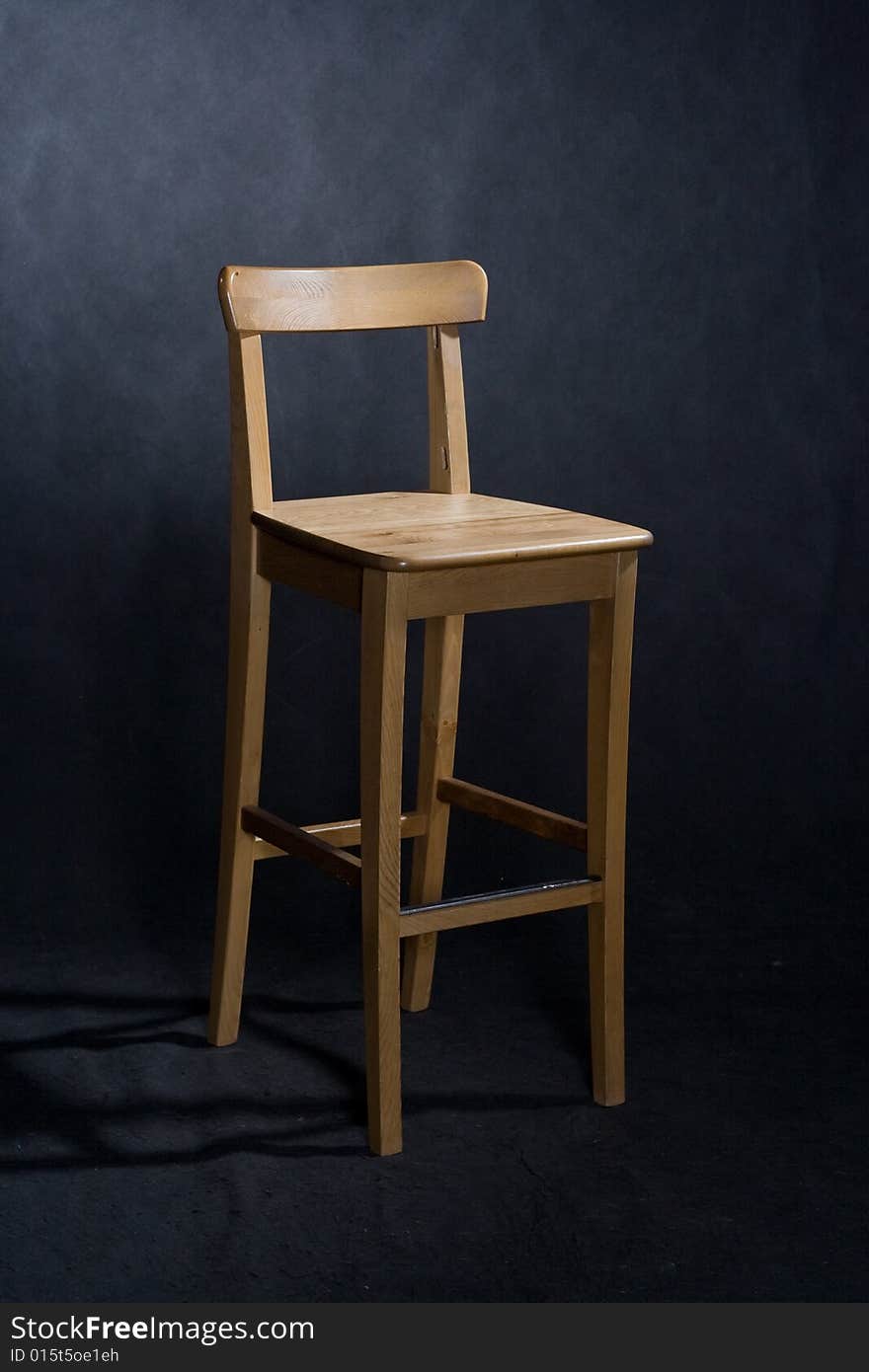 Wooden lacquered chair on black