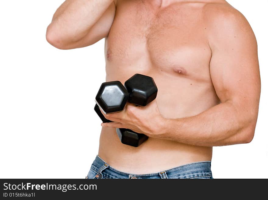 Young man with black dumbbells. Young man with black dumbbells