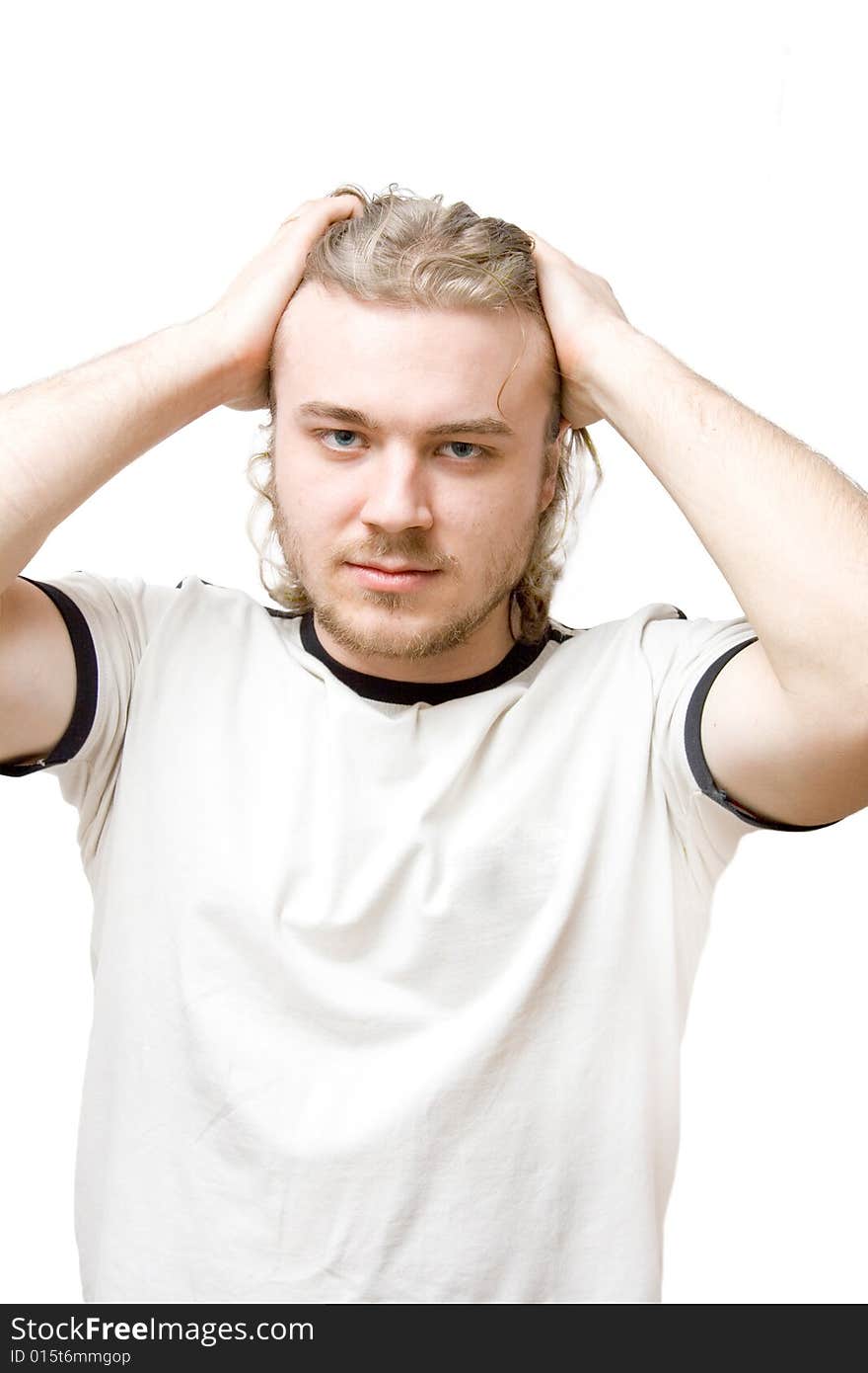 Young sportsman with blue eyes isolated on white (without numbers on shirt)