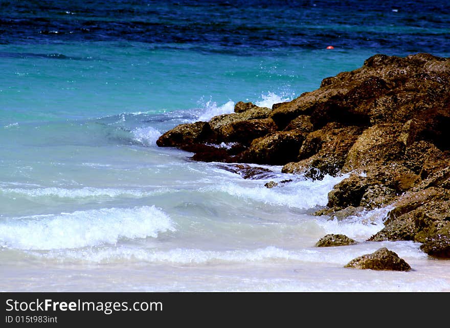 Water splashing off rocks in the Bahamas. Water splashing off rocks in the Bahamas.