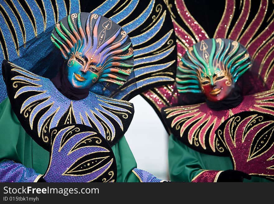 Two people in costume at the Venice Carnival. Two people in costume at the Venice Carnival