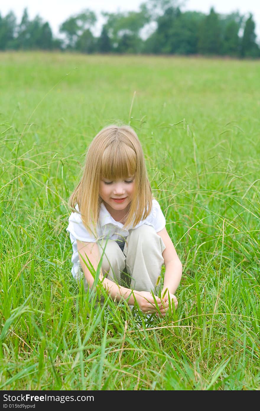 A 4 year old girl enjoying the outdoors. A 4 year old girl enjoying the outdoors