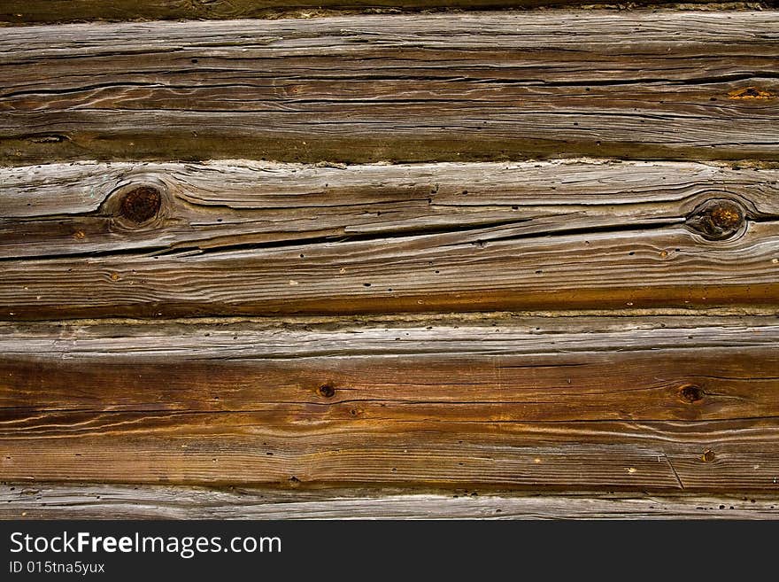 Fragment of a wall of the wooden house. Year of construction - 1926. A natural tree. Without a sheeting. Fragment of a wall of the wooden house. Year of construction - 1926. A natural tree. Without a sheeting.