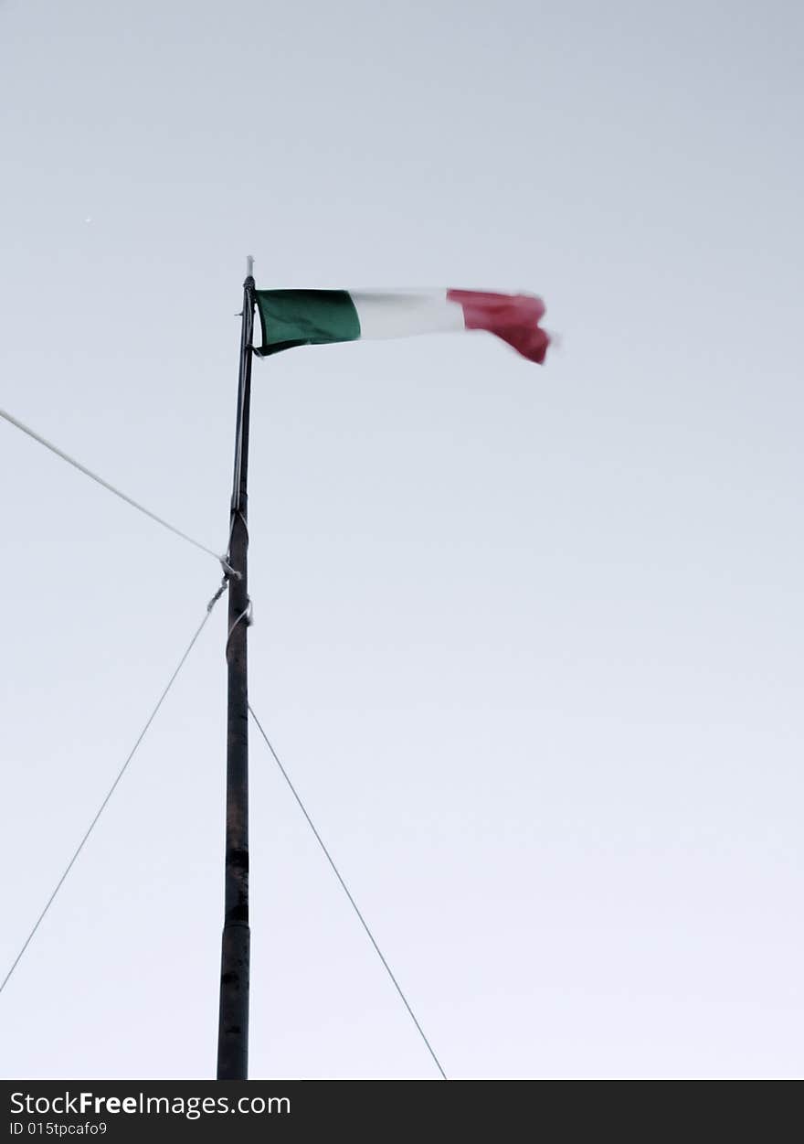 An Italian waving flag in a minimal composition. An Italian waving flag in a minimal composition.