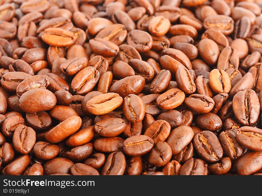 Fried coffee beans as background