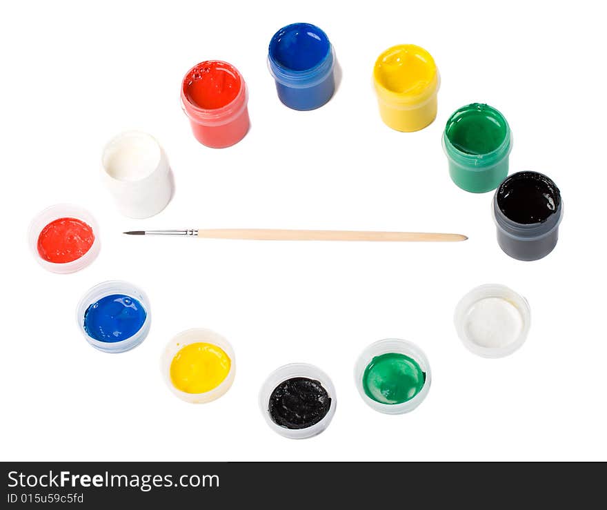 Close-up paints and paintbrush, isolated on white