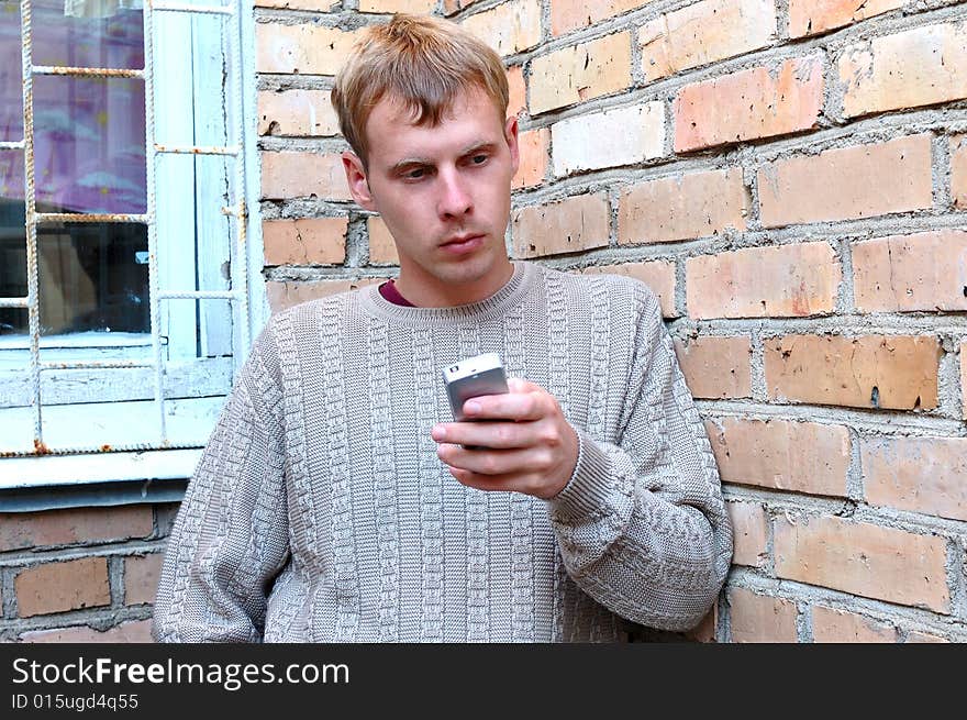 Young stylish man talk on mobile phone.