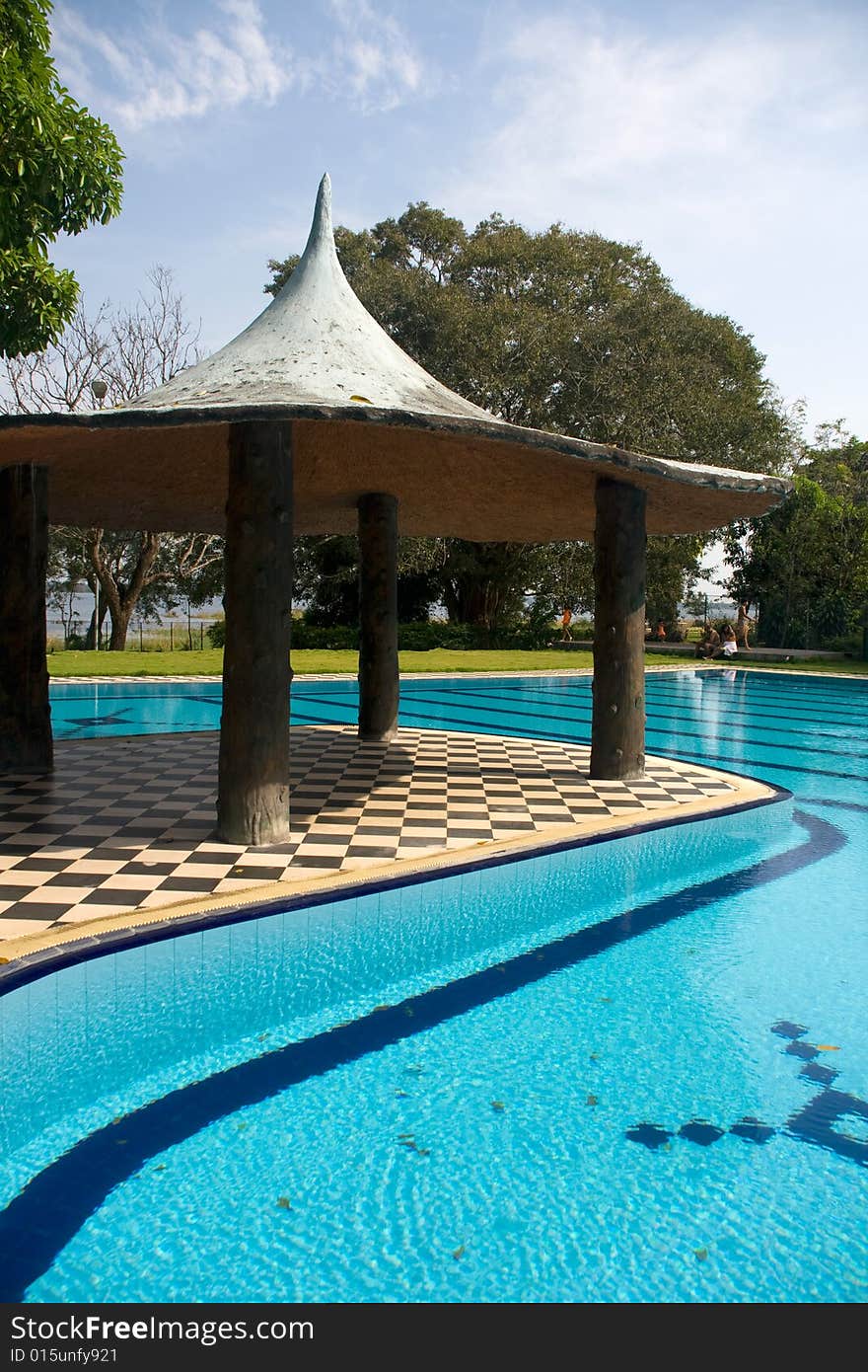 Swimming pool with ethnic penthouse