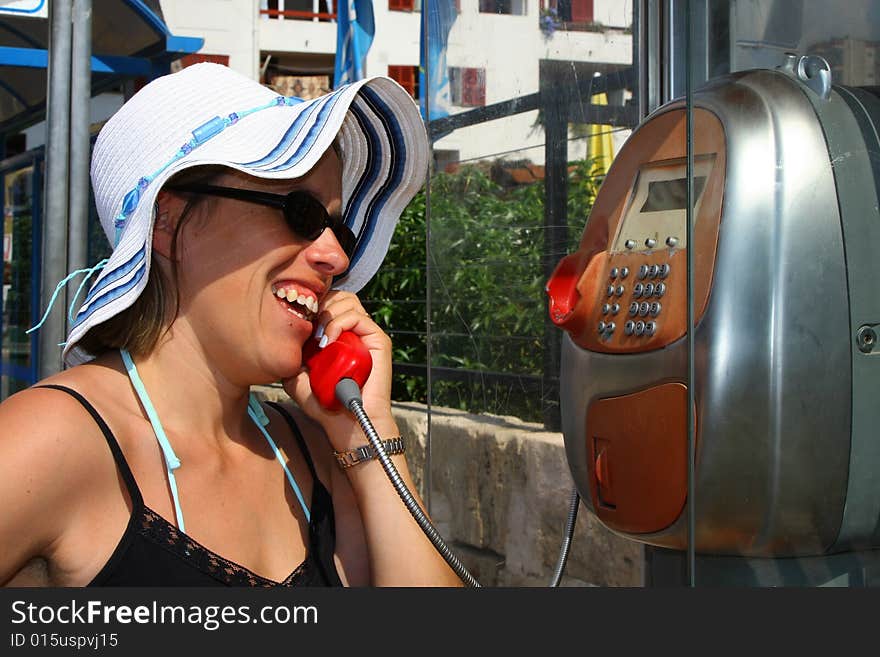 Publishes a telephone booth on the street