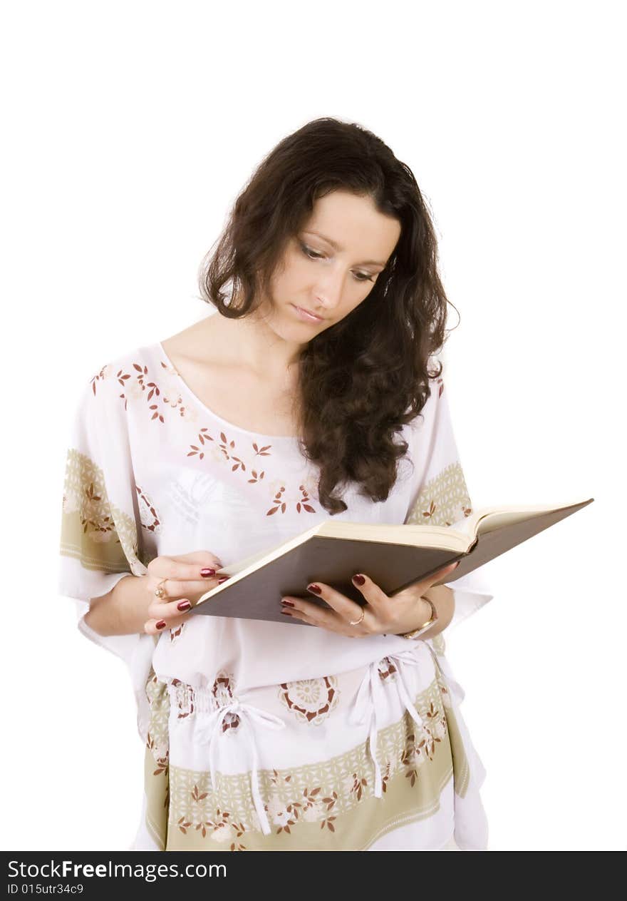 Young women reading book on white ground