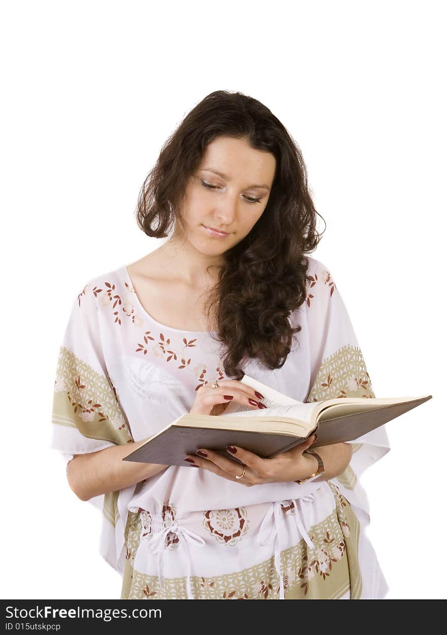 Young women reading book on white ground