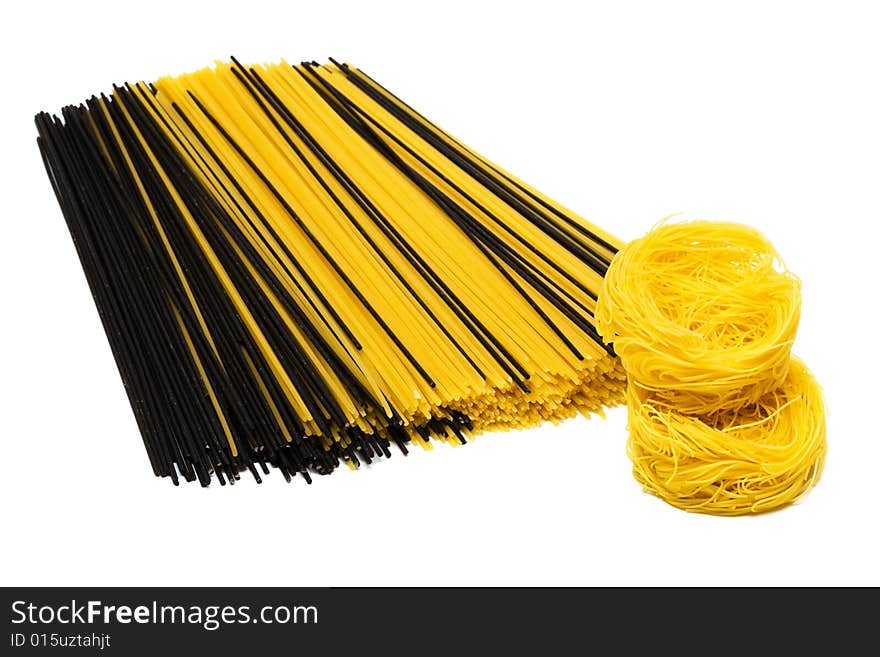 Different beautiful pasta on a white background