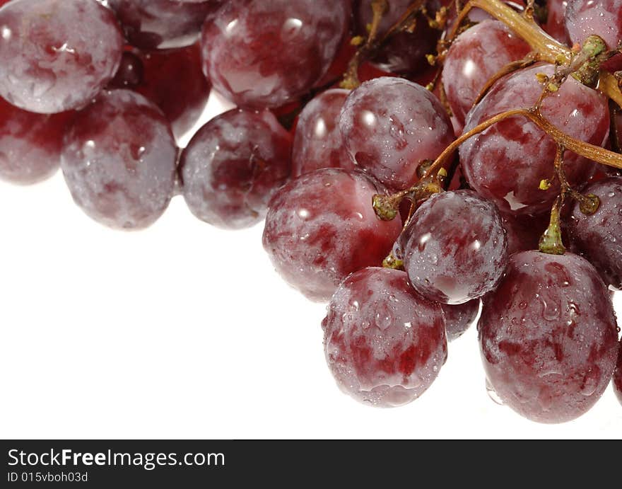 Red grapes isolated on white