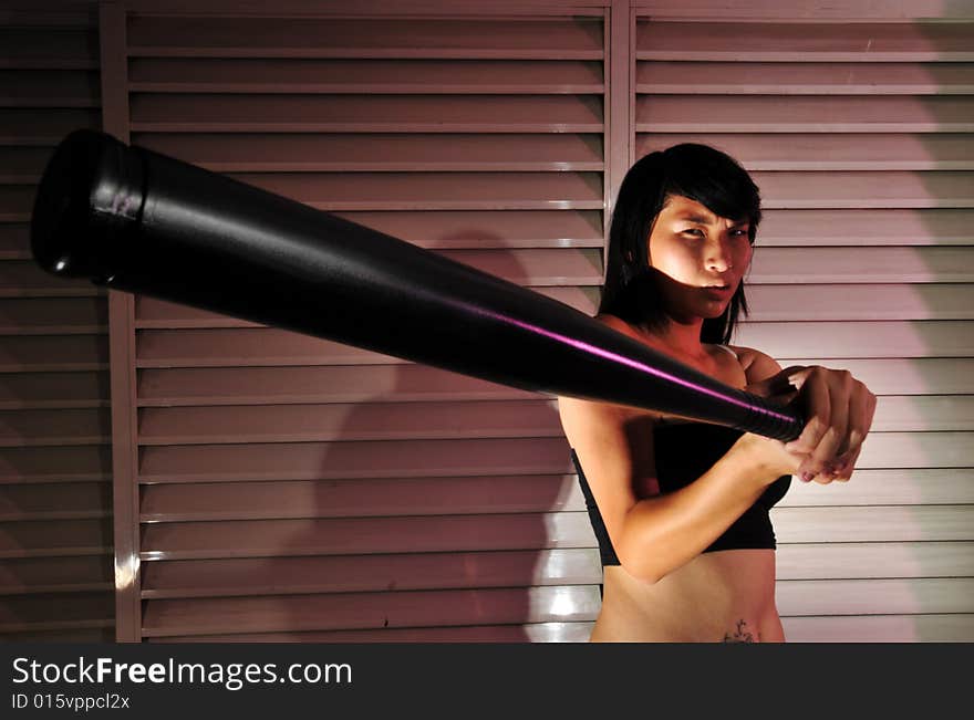 Girl behaving badly. Gangster girl using weapon, violence. Useful for depicting such images or showing rebellious youth. Girl behaving badly. Gangster girl using weapon, violence. Useful for depicting such images or showing rebellious youth.