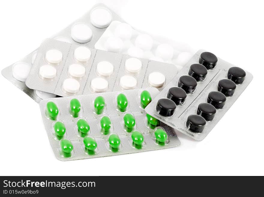 Several types of pills in their packages. Several types of pills in their packages