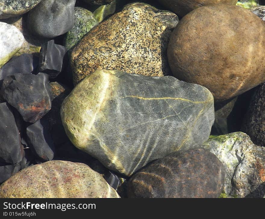 Many stones directly below the water line. Many stones directly below the water line