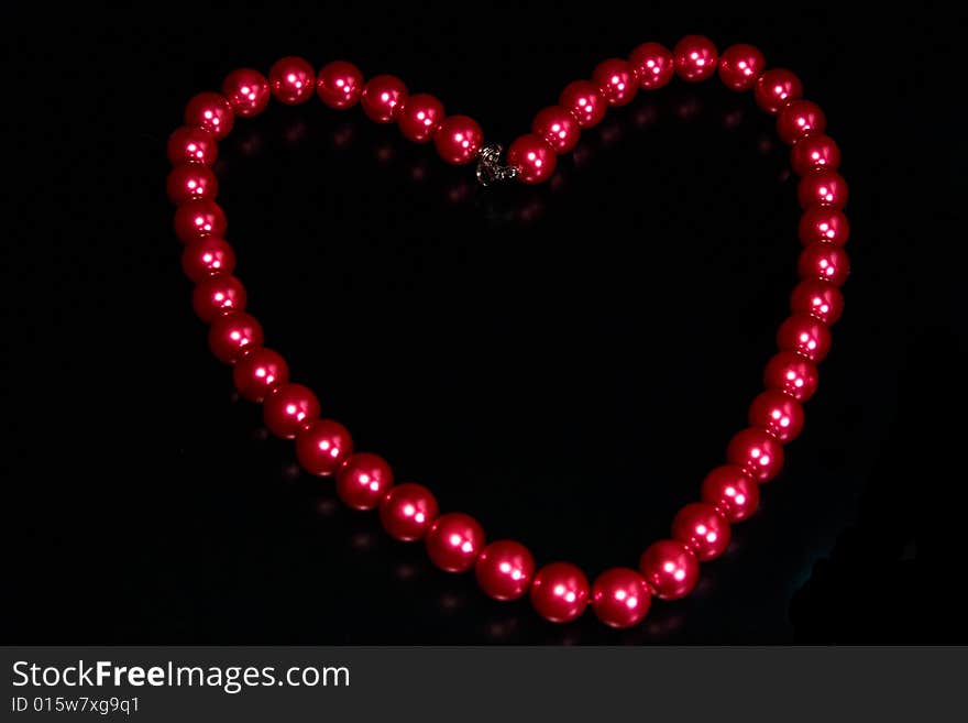 Red heart on a black background