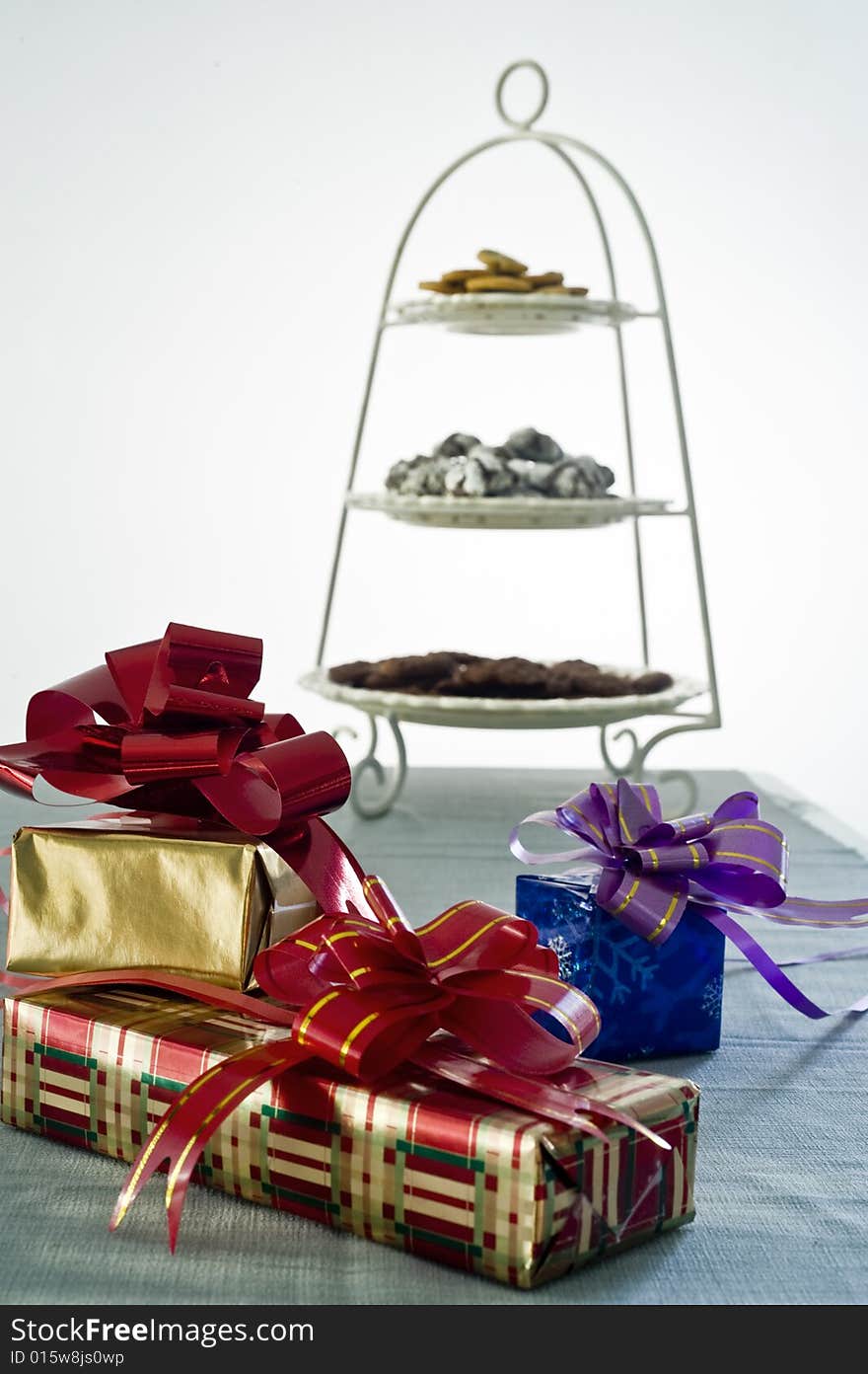 Gifts in a party with cookies in the background