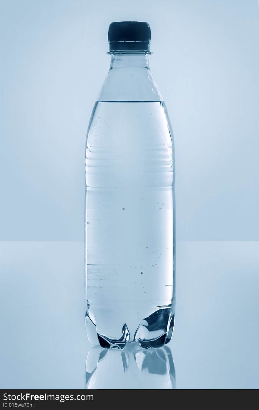 Isolated Generic Plastic Bottled Water with No Label, with a bit of reflection. Isolated Generic Plastic Bottled Water with No Label, with a bit of reflection.