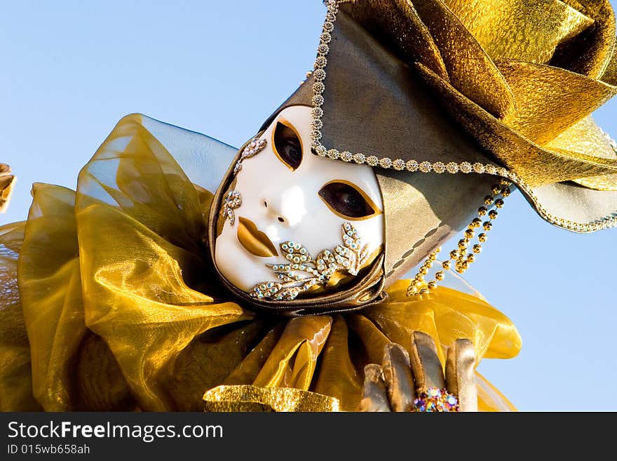 A Venetian Woman In A Gold Costume